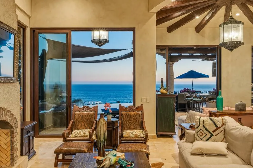 Lux Dream Villa living room opening to an ocean-view terrace